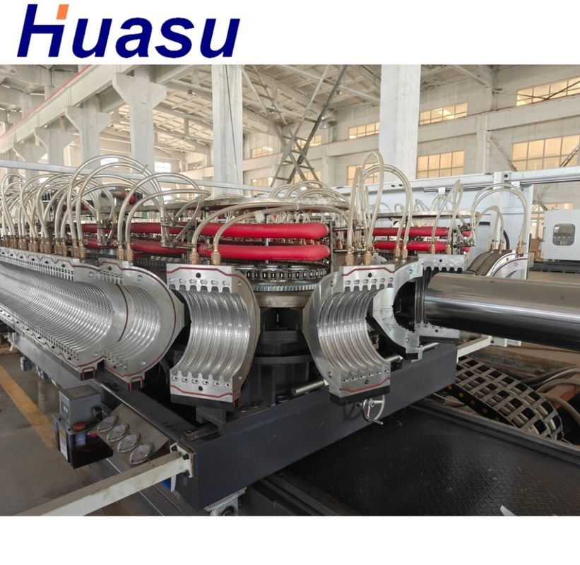 Linea di estrussione per la fabbricazione di tubi a doppia parete di corrugatura singola di grado automatico